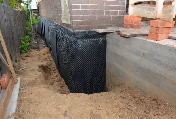 Happy homeowners after waterproofing job in Middlebranch